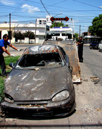 17/02/2008:  El Municipio y la Polic�a retirar�n autos siniestrados de la v�a p�blica.  Los trabajos de retiro comenzaron minutos despues de firmado el convenio. 